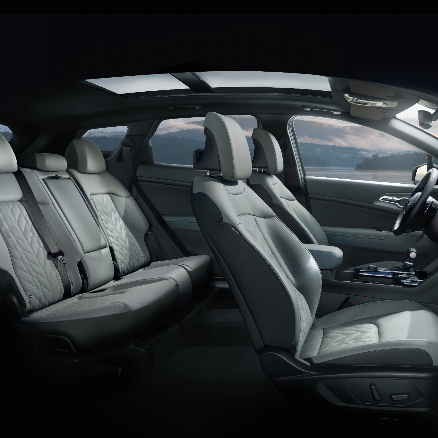 Front seats and dashboard inside a Kia Sportage